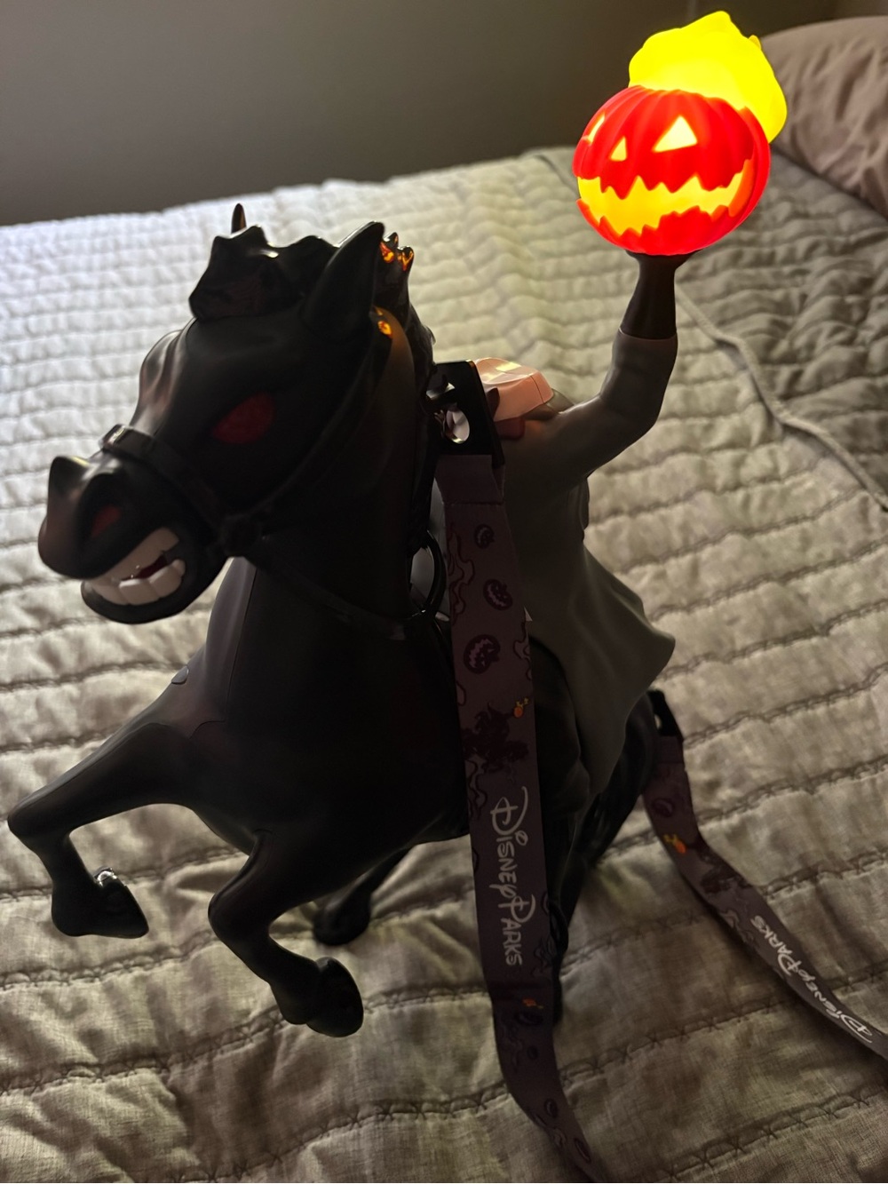Disney Black Headless Horseman Figure with Glowing Orange Pumpkin
